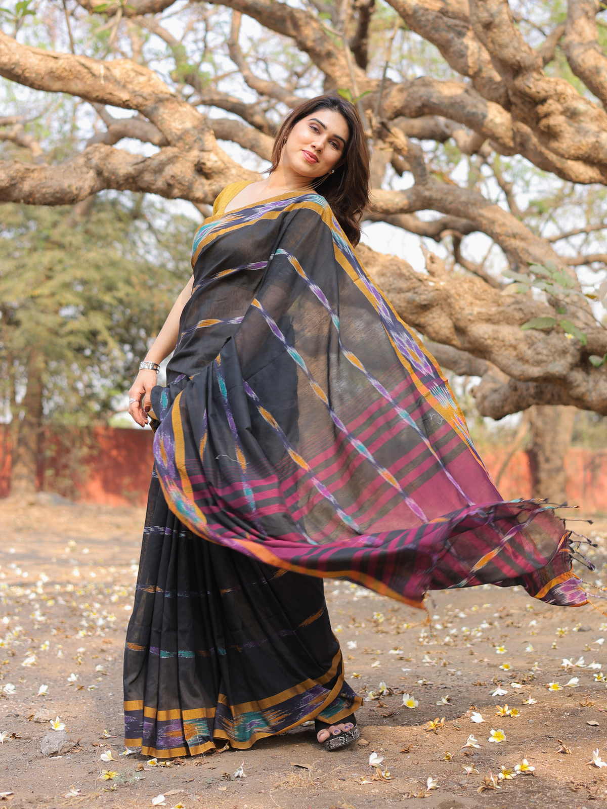 Darsh black ikat weave saree with contrast blouse
